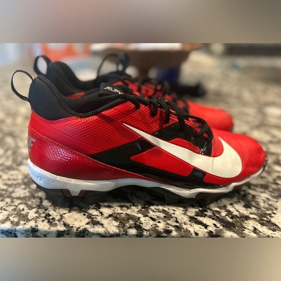 Nike Alpha Kids Red and White Cleats - Picture 1 of 5